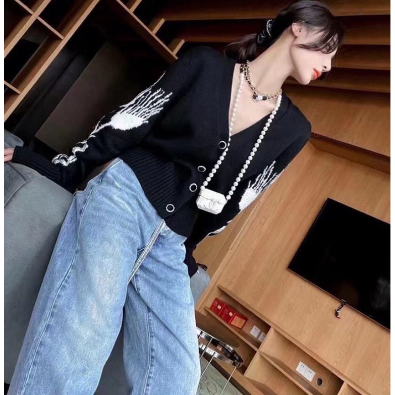 Áo khoác len cadigan nữ dệt kim hình công tay áo dáng ngắn Quảng Châu