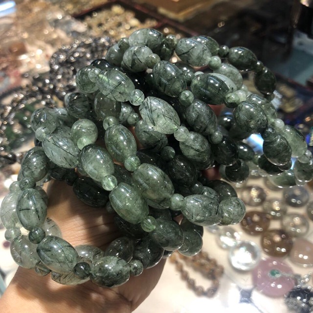 Vòng tay lu thống tóc xanh
