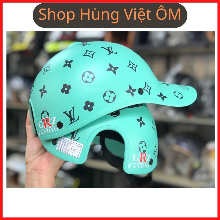 Mũ bảo hiểm lưỡi trai cho nữ LV cao cấp, thời trang nhiều màu khoét lổ búi tóc. Nón bảo hiểm lưỡi trai LV cho nữ hot hot