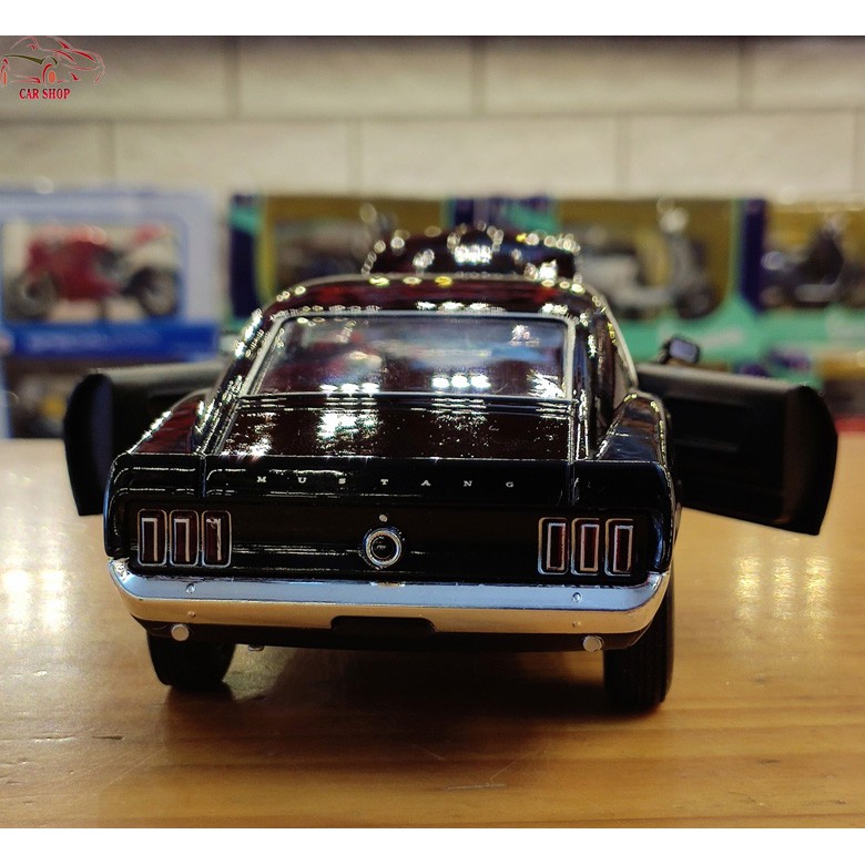 Mô hình xe ô tô Ford Mustang Boss 429 hãng Welly FX tỉ lệ 1:24 màu đen