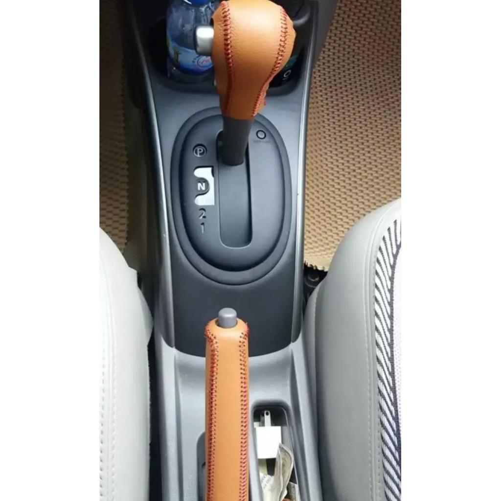 Bọc da cần số + phanh tay xe nissan sunny số tự động
