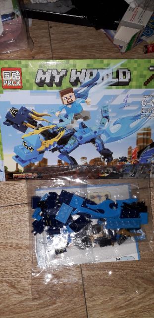 Lắp ráp 1 hộp LegoMyWord Rồng 63004 có nhiều chi tiết bằng nhựa ABS