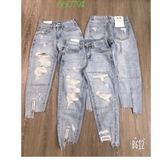 Quần jean rách gấu lệch khoá