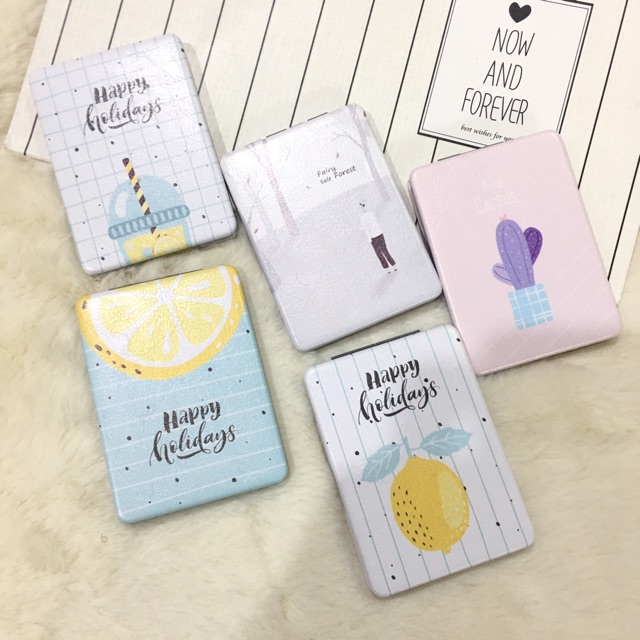 *gương cầm tay:mẫu 2 mặt:1 mặt thường và 1 mặt phóng to