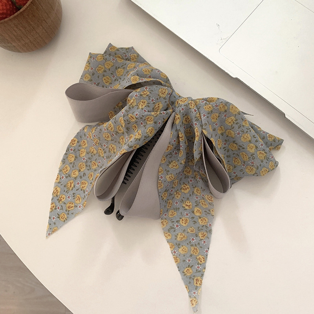 Kẹp tóc đính nơ dễ thương xinh xắn dành cho phái nữ