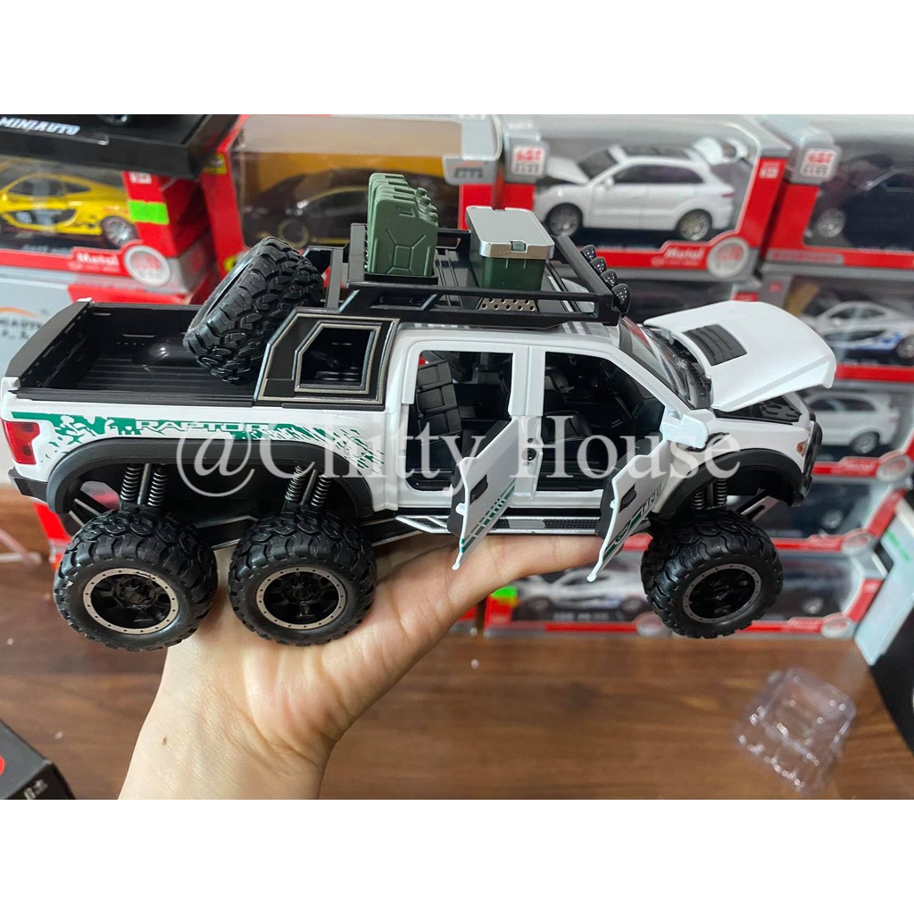 Mô hình xe Ford Raptor F150 địa hình 1:28 Chất Liệu Hợp Kim, Có Đèn Và Âm Thanh