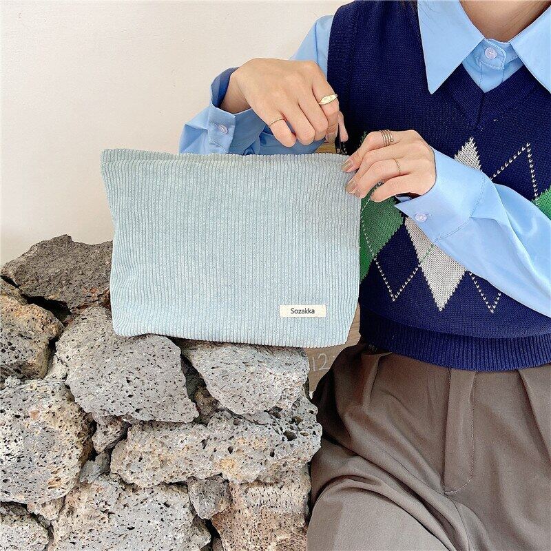 Túi Đựng Mỹ Phẩm Bằng Vải Nhung Kẻ Có Khóa Kéo Thời Trang Dành Cho Nữ