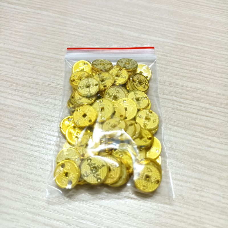 Bịch 50 gr đồng xu nhựa 15,20,25 li  trang trí cây kim tiền tài lộc,tháp tỏiq