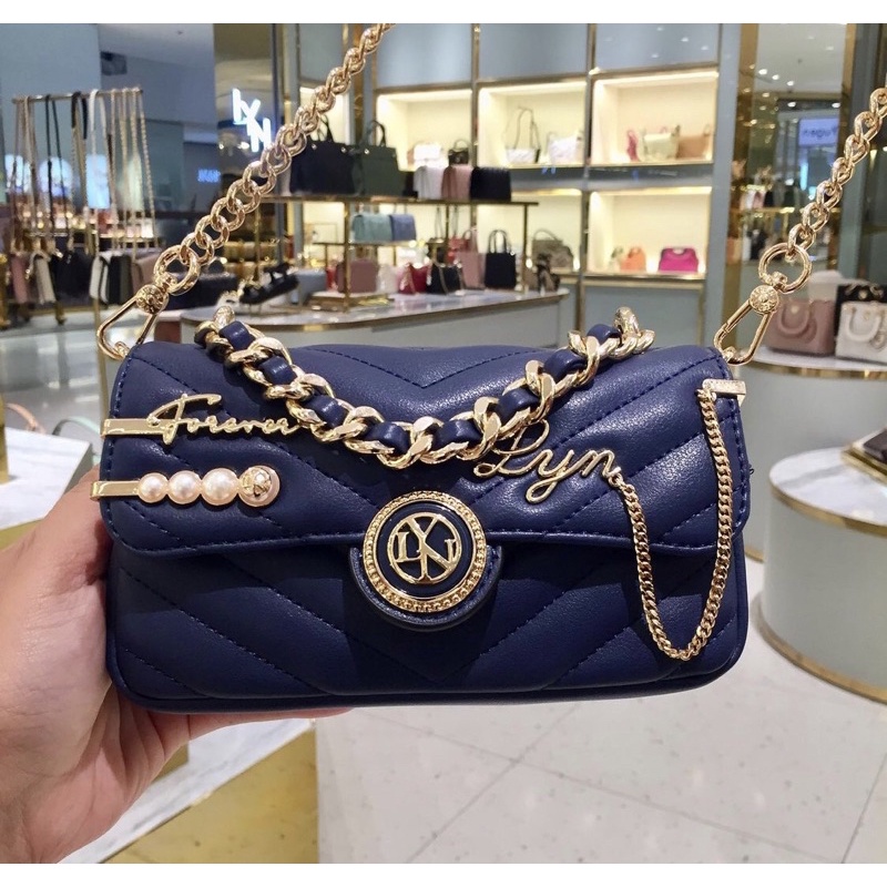 Túi lyn lady khoá tròn huy hiệu