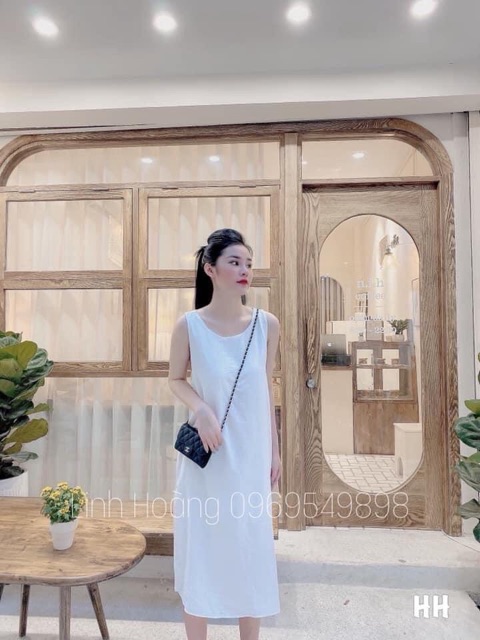 Váy maxi đũi nhăn đan chéo lưng màu trắng dáng dài | BigBuy360 - bigbuy360.vn