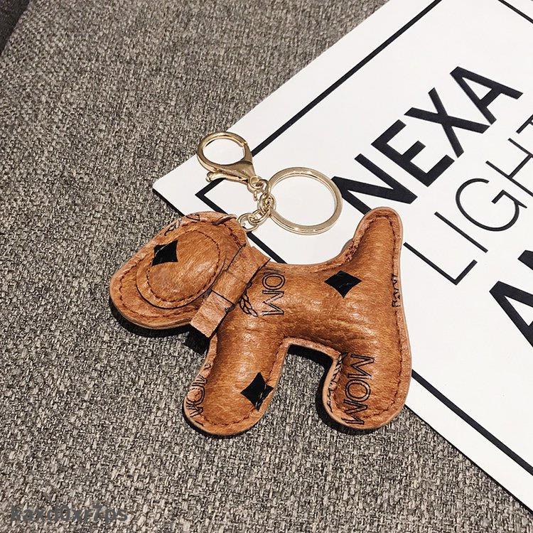 HOT Móc khóa hình chú chó in logo MCM dễ thương