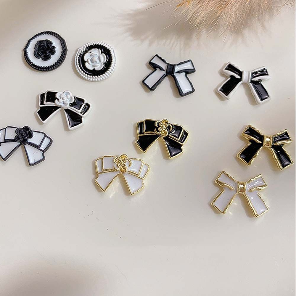 [Hàng mới về] Hạt phụ kiện trang trí móng tay thủ công bằng hợp kim hình nơ nhiều kiểu màu trắng đen kiểu Pháp lãng mạn