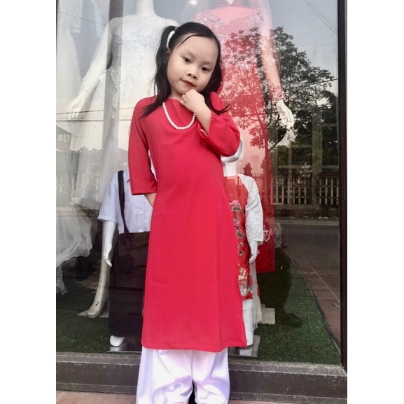 Bộ áo dài trắng và đen nữ sinh cho bé gái