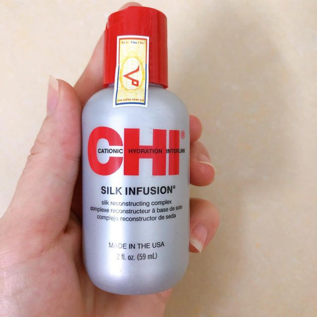 TINH DẦU TINH CHẤT TƠ DƯỠNG TÓC BÓNG MƯỢT CHI SILK INFUSION USA 59ML