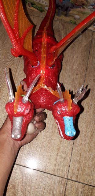 Khủng long chạy PIN 2 đầu có cánh và đẻ trứng có nhạc đèn Led tặng kèm PIN