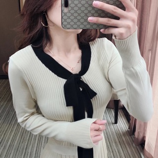 Váy len montoghi cổ nơ