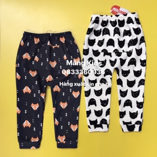 Quần Nỉ Bông Hoạ Tiết Trắng Cam Đen