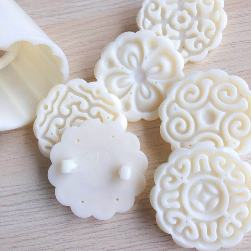 Bộ dụng cụ trang trí bánh trung thu gồm dụng cụ nhấn và 6 khuôn dập nổi họa tiết bông hoa 3D phù hợp cho bánh cỡ 50g