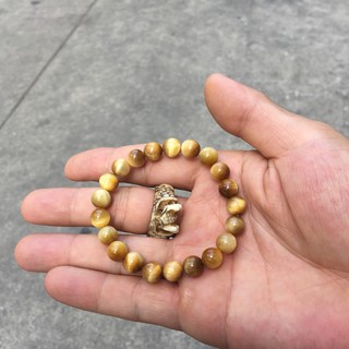 Vòng tay phong thủy m. h tâm vàng 8 ly đb