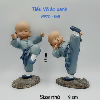 2 tượng chú tiểu võ áo xanh