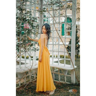 Đầm maxi vàng hở lưng