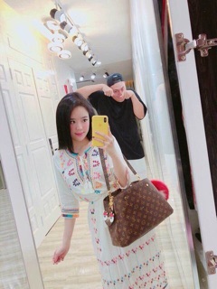 Đầm thô thêu hoa