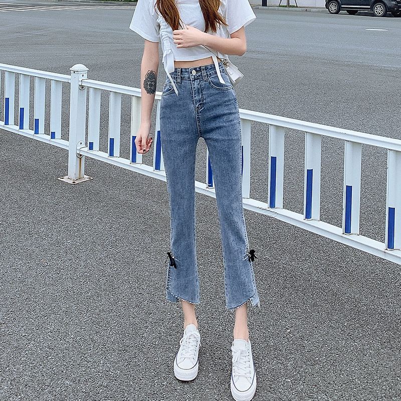 Bow stretch micro-horn forked jeans women's high waist, abdomen, body-building, nine-cent pants, thin style in summer.