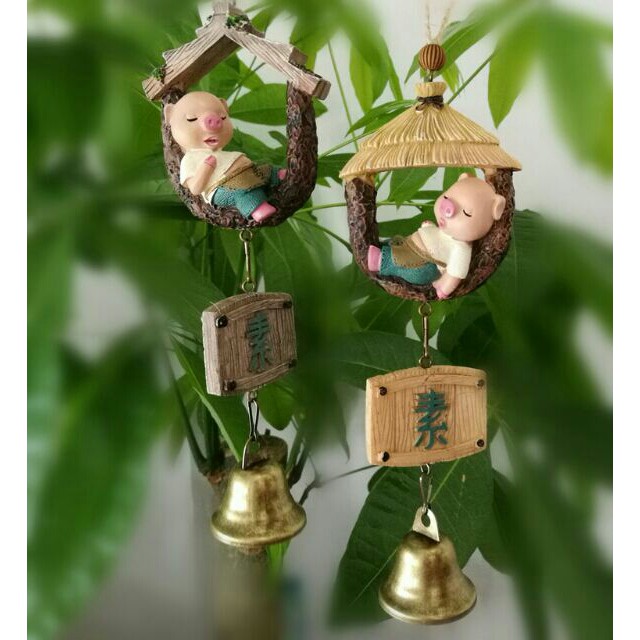 Chuông gió heo lười