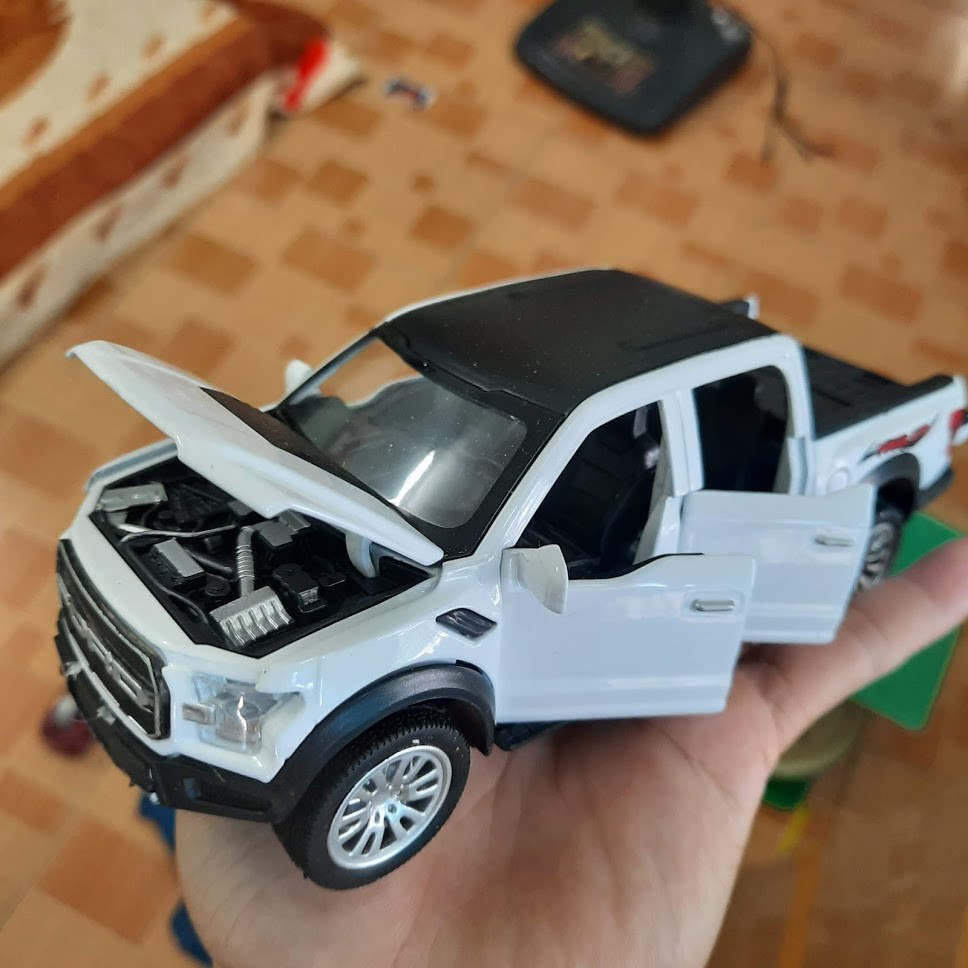 Mô hình xe ô tô ford ranger 1:32 jackie kim đồ chơi trẻ em làm bằng kim loại xe chạy cót mở được cửa có đèn và âm thanh