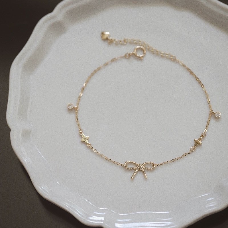 Lắc tay Bow bracelet chất liệu bạc 925 mạ vàng 14k