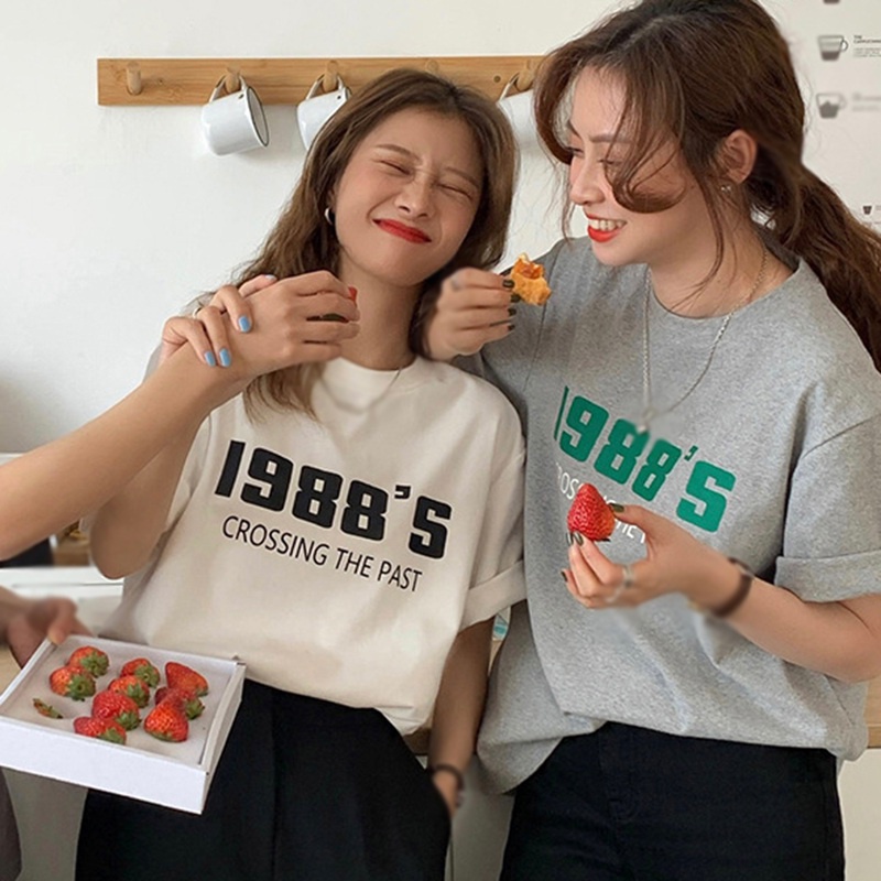 Áo thun ngắn tay cổ tròn form rộng in chữ thời trang Hàn Quốc cho nữ