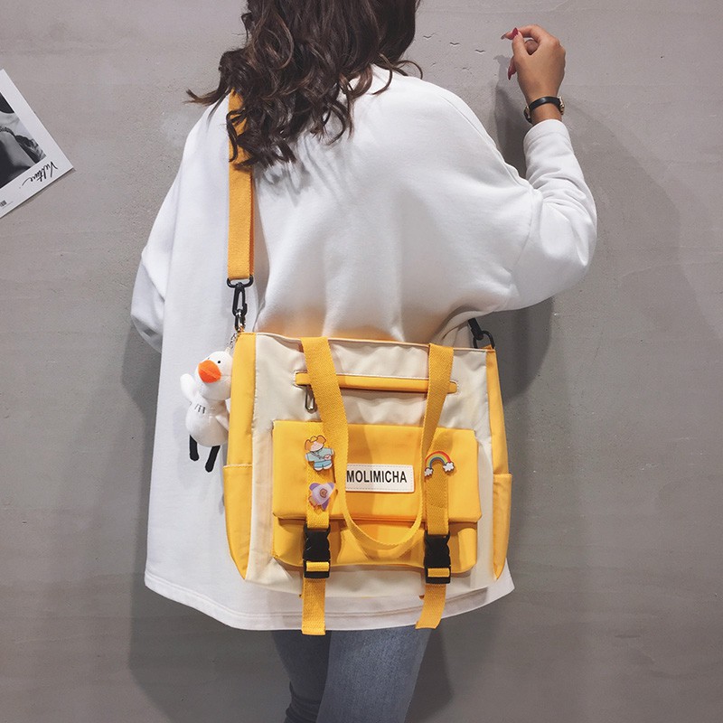 Người đưa tin vải Nhật Bản nữ học sinh trung học cơ sở dạy kèm túi xách túi xách cặp học sinh dung lượng lớn túi đeo vai hoang dã