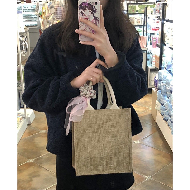 Áo khoác nữ dáng rộng thời trang phong cách Hàn Quốc