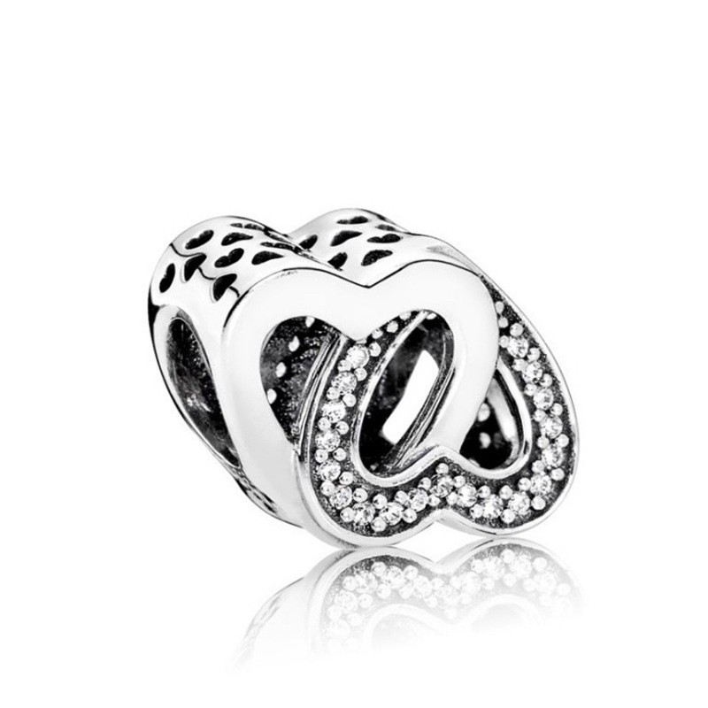 charm pan xỏ ngang 2 trái tim đính đá bạc s925