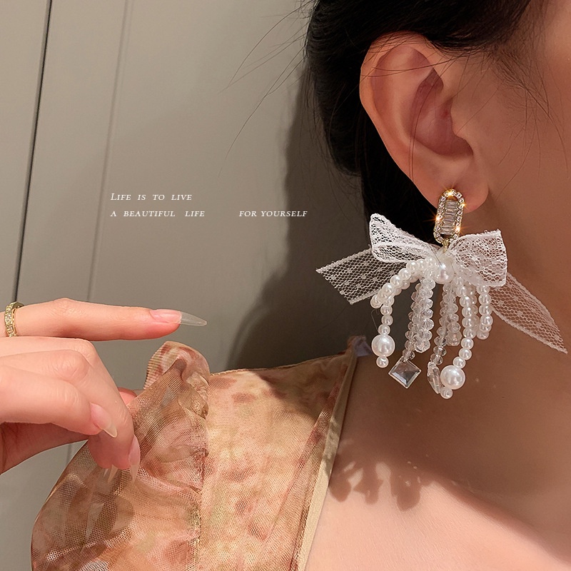 Khuyên tai bạc 925 phối nơ đính đá zircon và ngọc trai nhân tạo thời trang