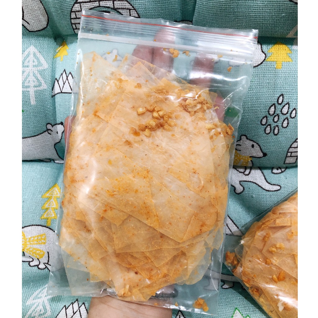 BÁNH TRÁNG MUỐI VÀNG TỎI PHI GIÒN ĐỘC QUYỀN - NGON LẮC LƯ SHOP (bịch zip 50g) | BigBuy360 - bigbuy360.vn