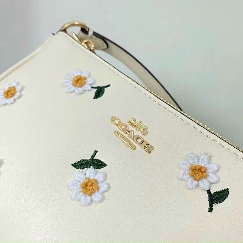 TÚI COACH NOLITA HOA CÚC