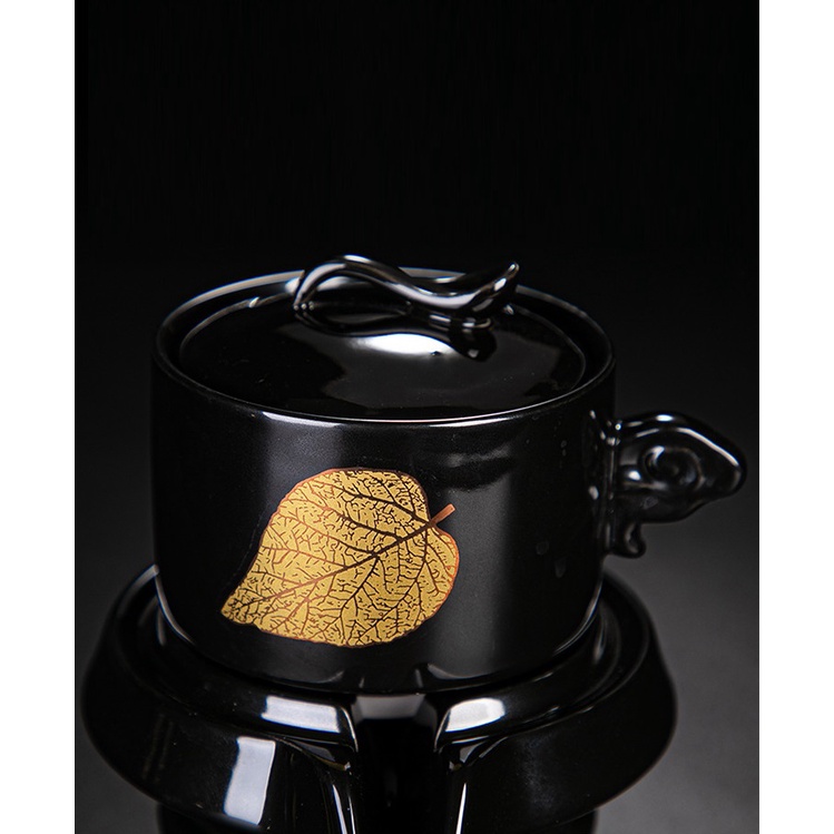 Bộ ấm trà tự động Kiểu Cối Xay vẽ họa tiết là Bồ Đề Vàng cao cấp kèm hộp quà