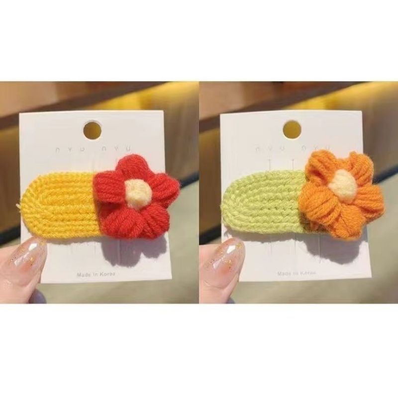 Kẹp tóc len hình bông hoa