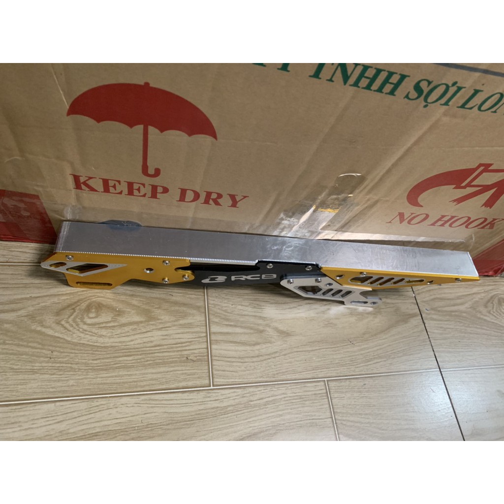 Che sên xe exciter 150 nhôm cnc màu vàng