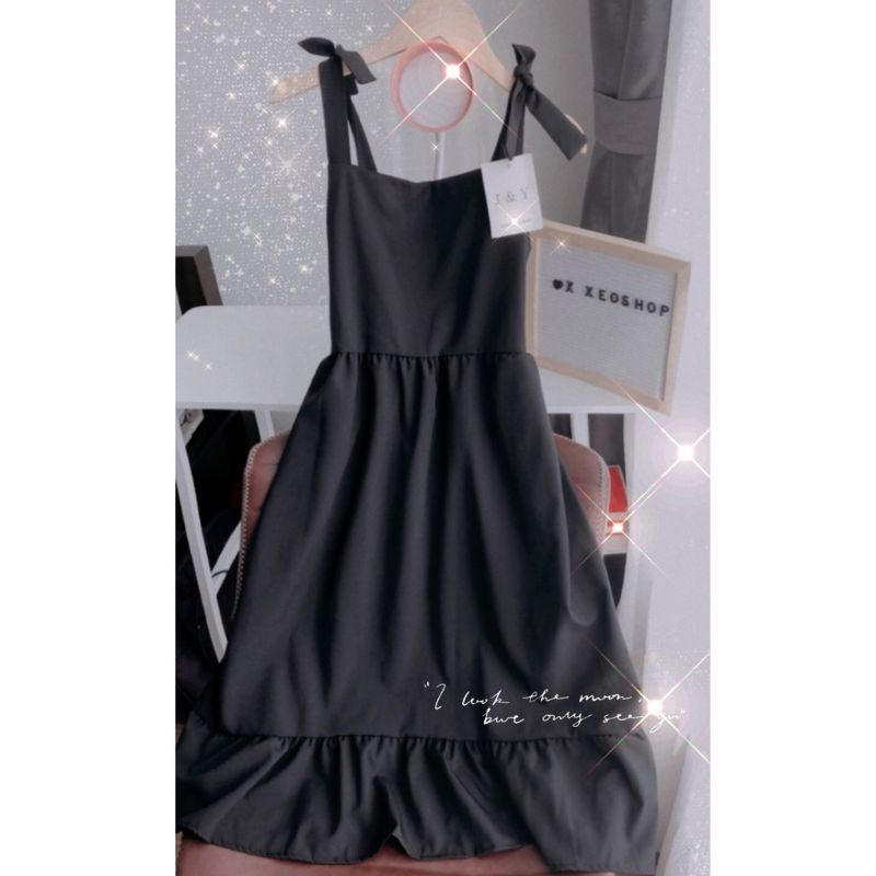 Đầm 2 dây cột nơ vải đũi cao cấp chất mịn và mát.