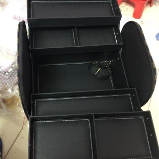Cố đựng đồ trang điểm cốp da