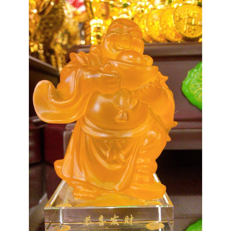 Tượng Phật Di Lặc lưu ly ôm thỏi vàng  .