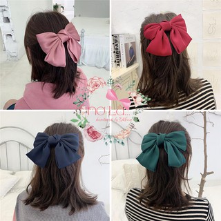 kẹp tóc nơ bản to màu đỏ tươi tắn