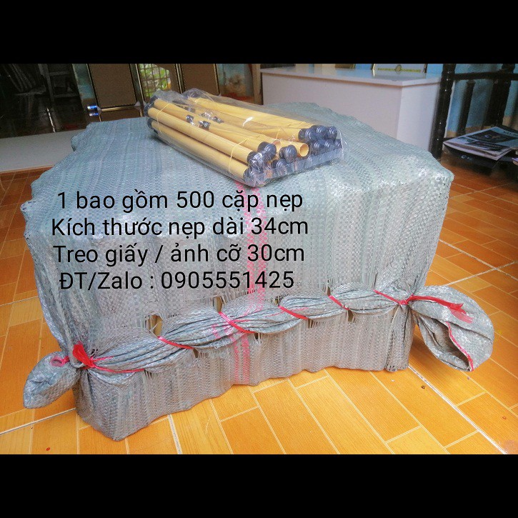 1  BAO ống trúc( nẹp) treo ảnh.Ống trúc(nẹp) treo giấy viết thư pháp.Ống trúc( nẹp) treo lịch, tranh, giấy a3. Dài 34cm