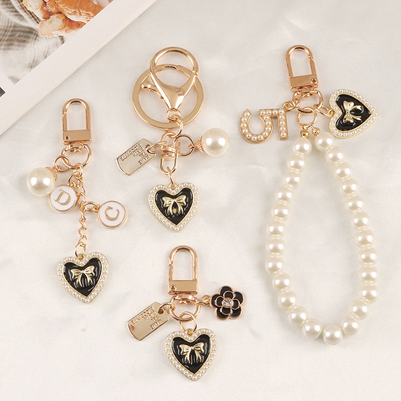 Móc chìa khóa phối hạt ngọc trai bằng hợp kim sáng tạo hình nơ/ ổ khóa/ trái tim trang trí cho túi xách