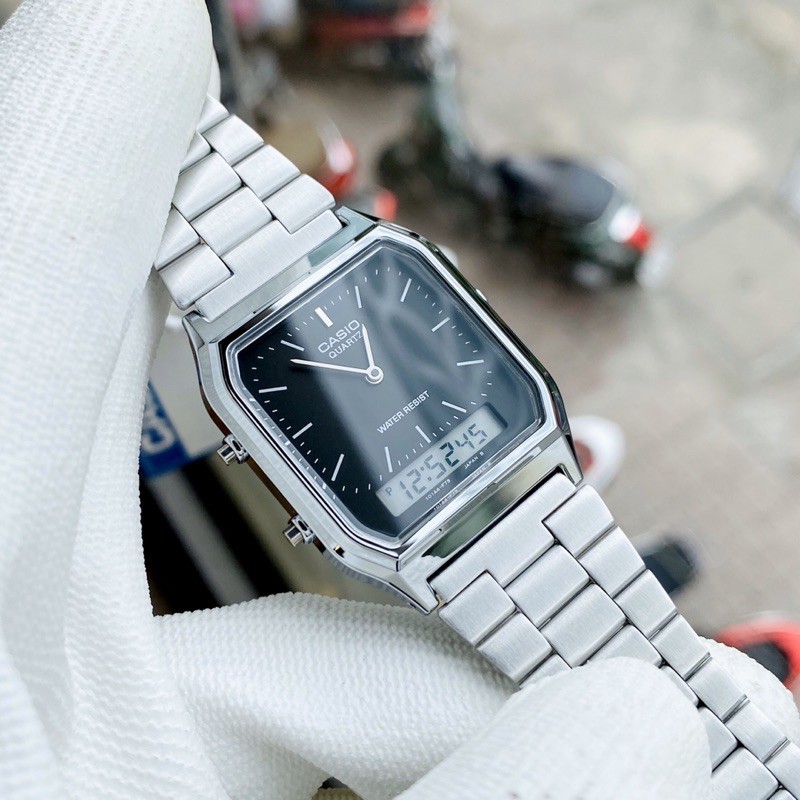 Đồng hồ kim điện tử nam nữ Casio AQ 230 silver mặt đen