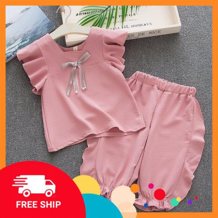 Bộ bé gái có nơ bánh bèo dễ thương nhún viền màu vàng - HG036-SY - Sale