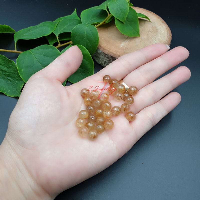 1 hạt đá tóc màu vàng