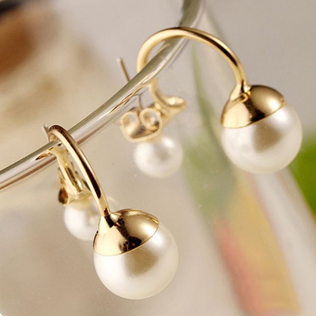 Khuyên tai nữ trang đính ngọc trai tạo hình độc đáo